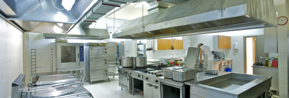 Commercial Kitchen With Stainless Steel Equipment Requiring Fire Protection Services
